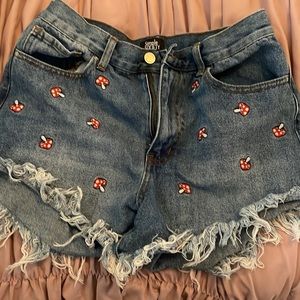 Cute mushrooms with denim and fringe at the bottom